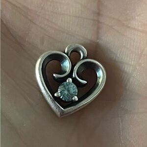 James Avery Remembrance heart charm in sterling silver with blue topaz gemstone